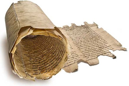 Ancient Bible text on rolled paper